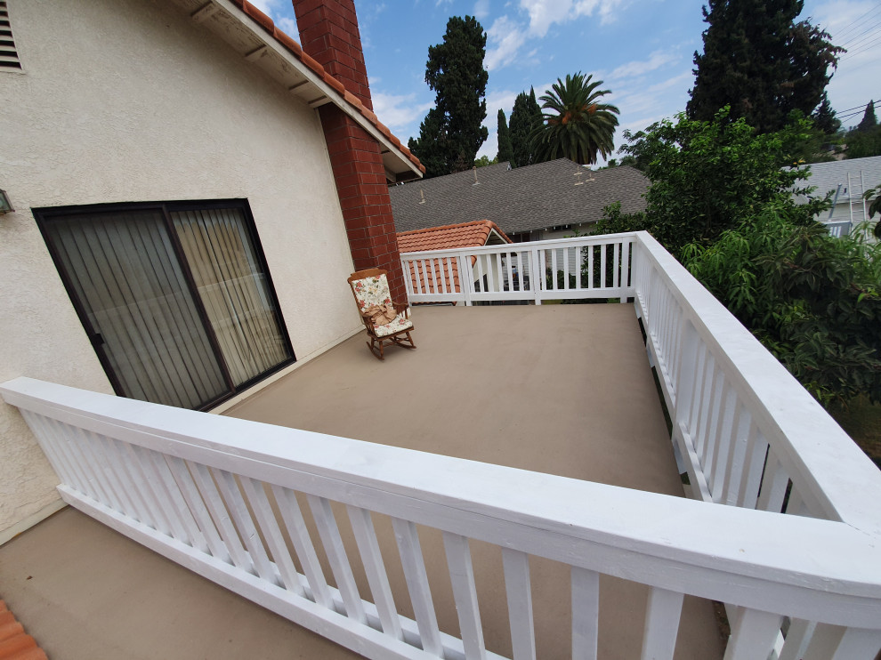Photo of a mid-sized arts and crafts deck in Orange County.