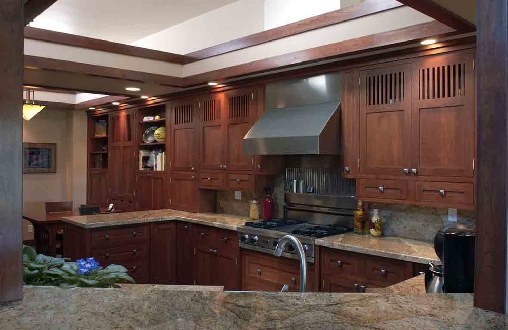 Inspiration for a large transitional galley ceramic tile eat-in kitchen remodel in Seattle with an undermount sink, medium tone wood cabinets, granite countertops, stainless steel appliances and an island