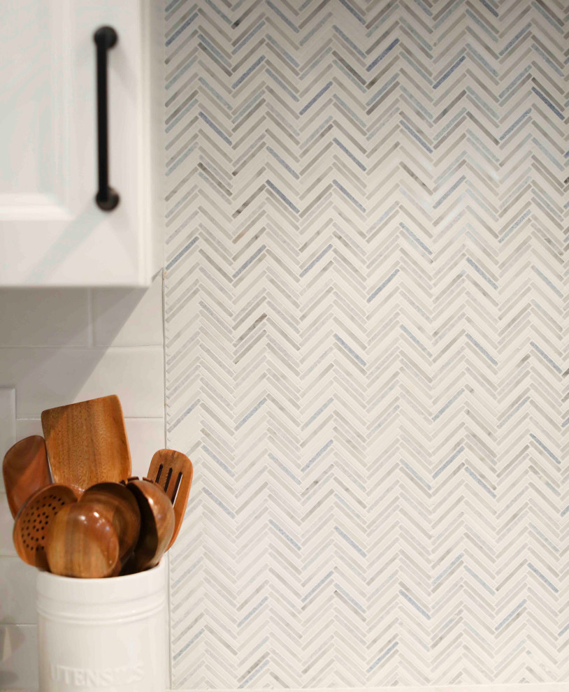 Example of a transitional home design design in Boston