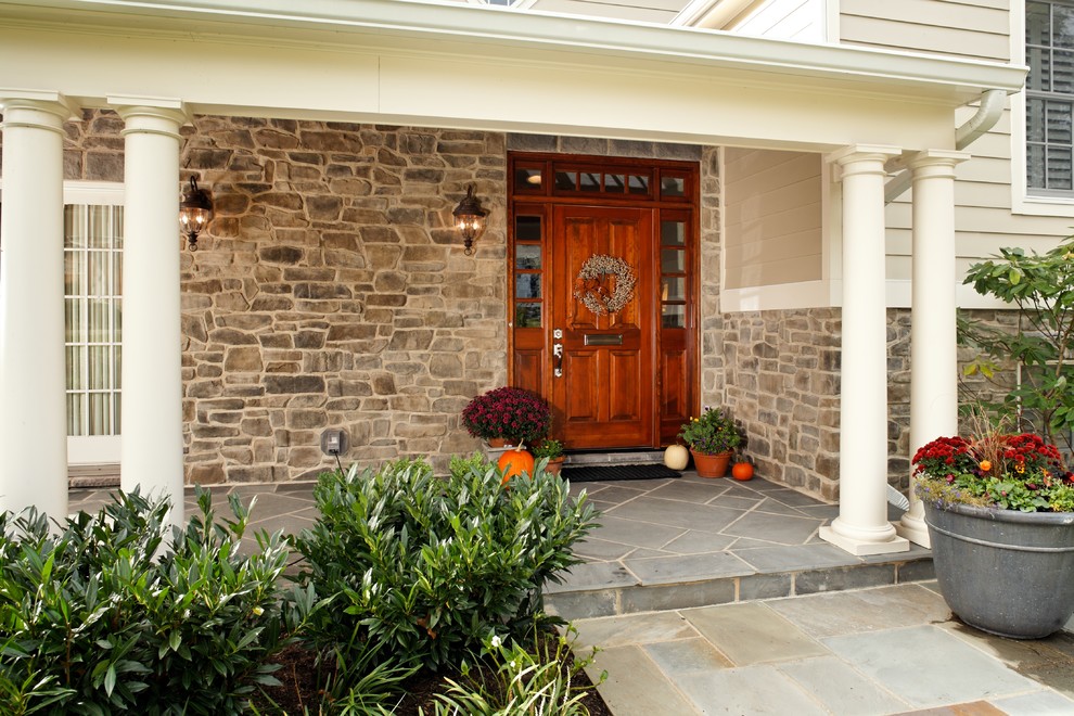 Photo of a traditional exterior in DC Metro with wood siding.