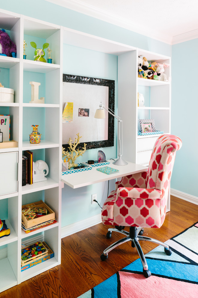 Contemporary kids' room in Other with blue walls.