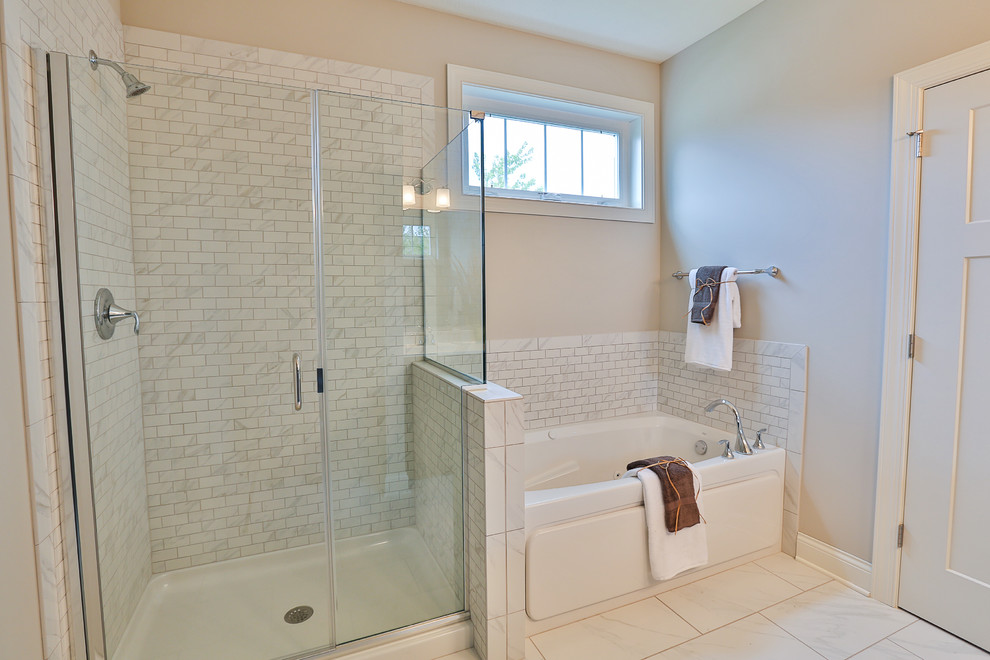 Design ideas for a mid-sized contemporary master bathroom in Minneapolis with an integrated sink, recessed-panel cabinets, dark wood cabinets, laminate benchtops, a drop-in tub, an alcove shower, a one-piece toilet, white tile, ceramic tile, beige walls and ceramic floors.