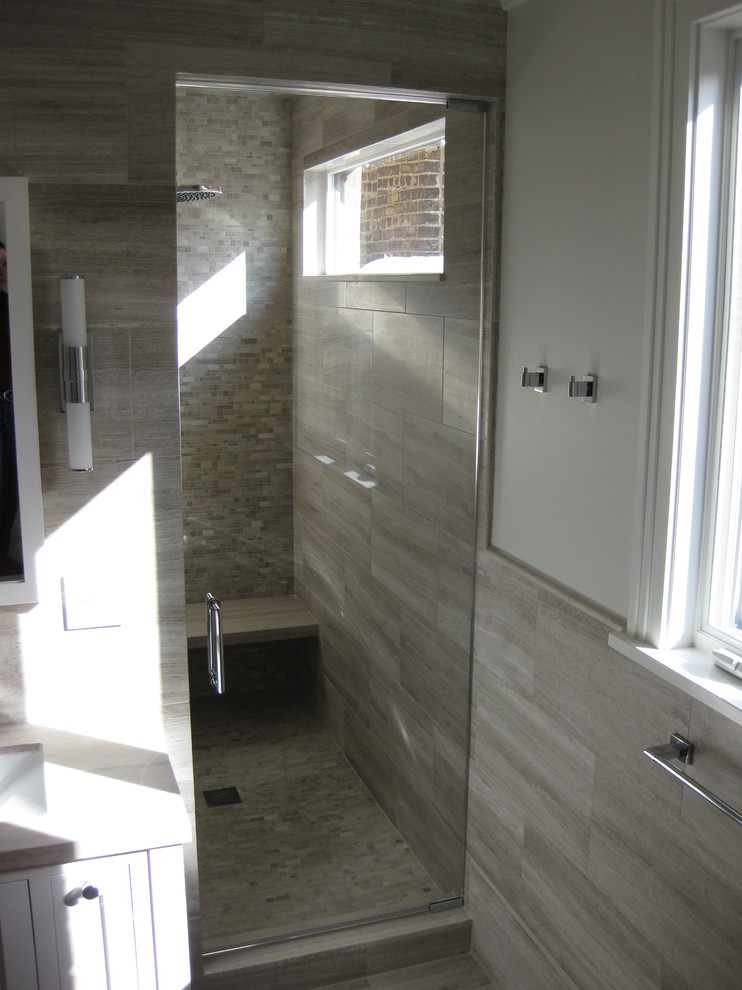 Mid-sized modern master bathroom in Chicago with an undermount sink, shaker cabinets, white cabinets, granite benchtops, an undermount tub, a wall-mount toilet, gray tile, porcelain tile, grey walls and porcelain floors.