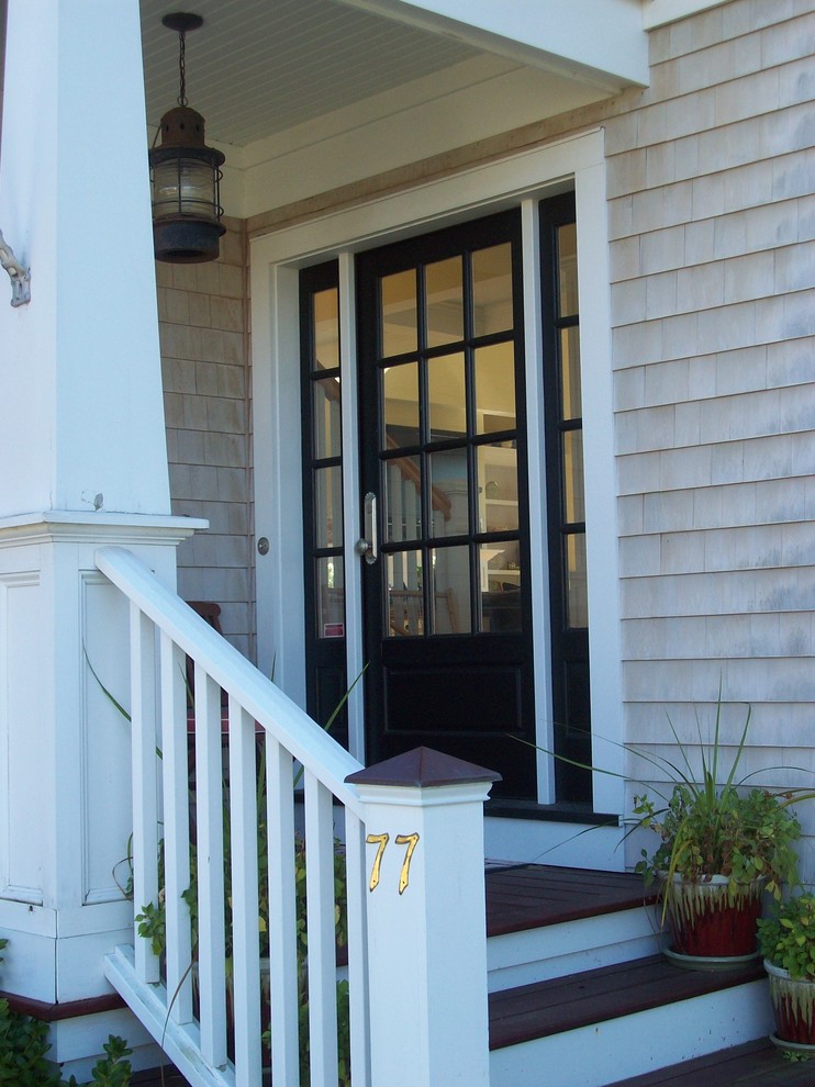 This is an example of a beach style entryway in Boston.