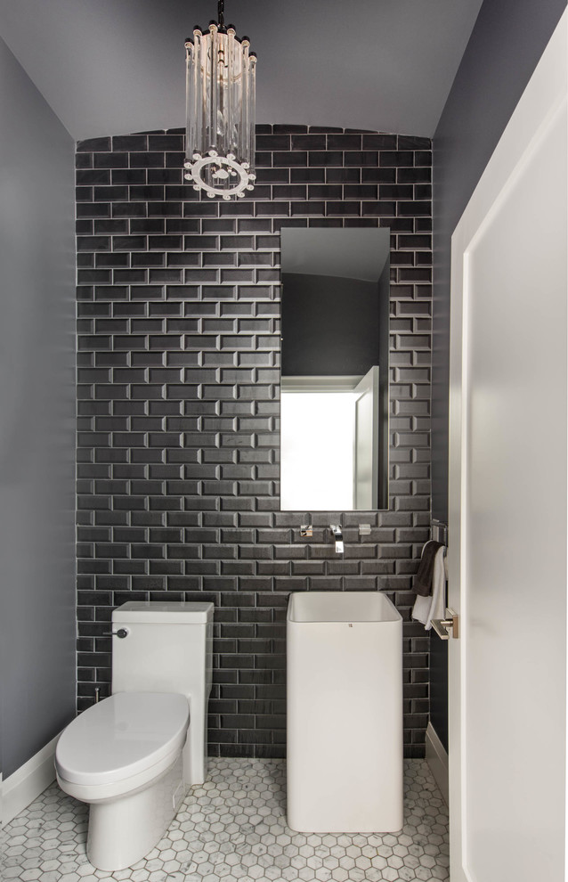 Design ideas for a small contemporary powder room in Toronto with a pedestal sink, a two-piece toilet, gray tile, black tile, white tile, subway tile, grey walls and mosaic tile floors.