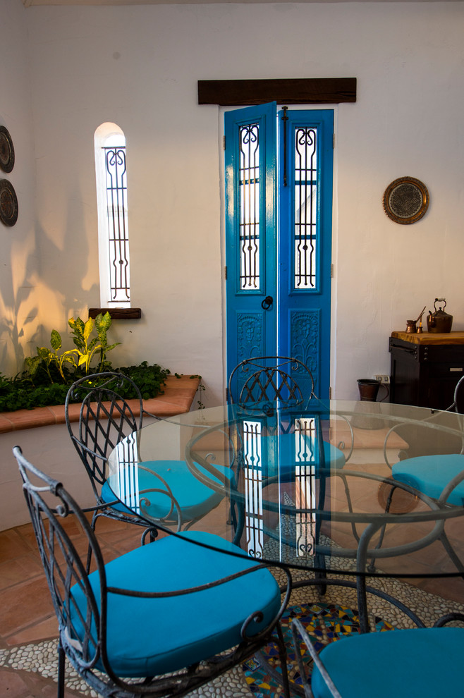 This is an example of a small mediterranean courtyard patio in Perth.