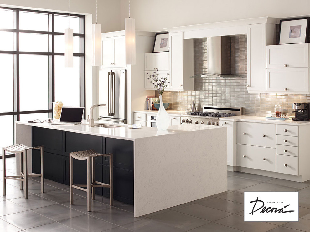 Mid-sized single-wall kitchen photo with shaker cabinets, white cabinets, blue backsplash, stainless steel appliances and an island
