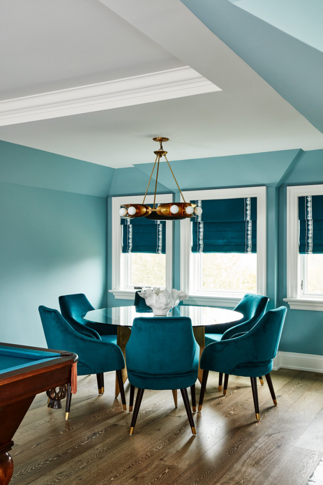 Photo of an expansive classic dining room in Toronto with blue walls, medium hardwood flooring, brown floors and a drop ceiling.