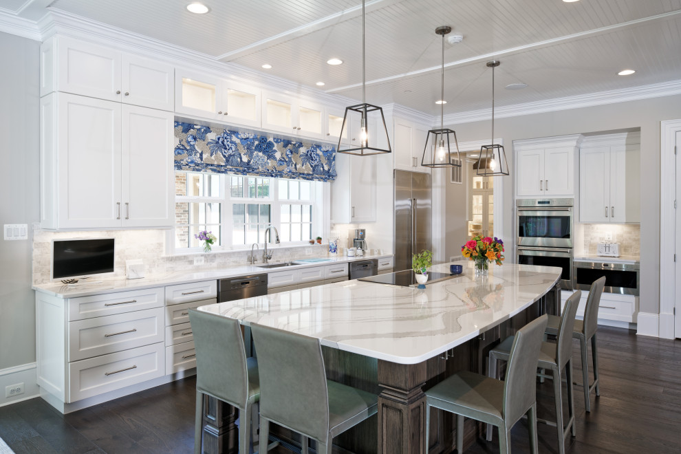 Inspiration for an expansive transitional l-shaped eat-in kitchen in DC Metro with brown floor, timber, recessed-panel cabinets, white cabinets, dark hardwood floors, with island, multi-coloured benchtop, an undermount sink, granite benchtops, multi-coloured splashback, ceramic splashback and stainless steel appliances.