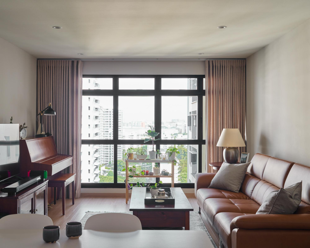 Inspiration for a Scandinavian living room in Singapore.