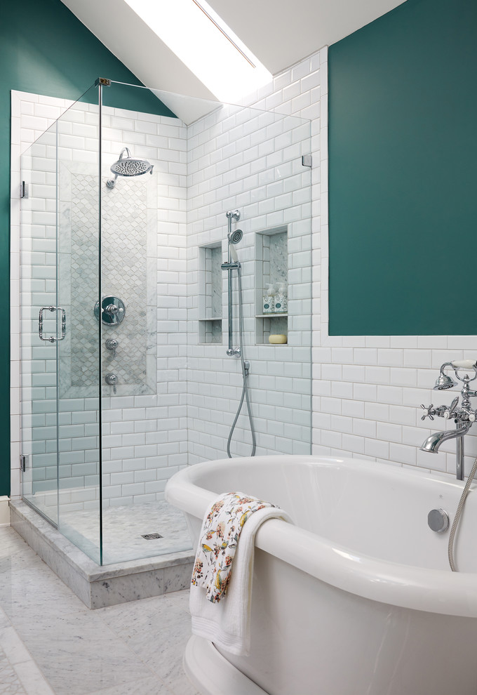 Inspiration for a large traditional master bathroom in DC Metro with white cabinets, a freestanding tub, a corner shower, white tile, subway tile, green walls, white floor and a hinged shower door.