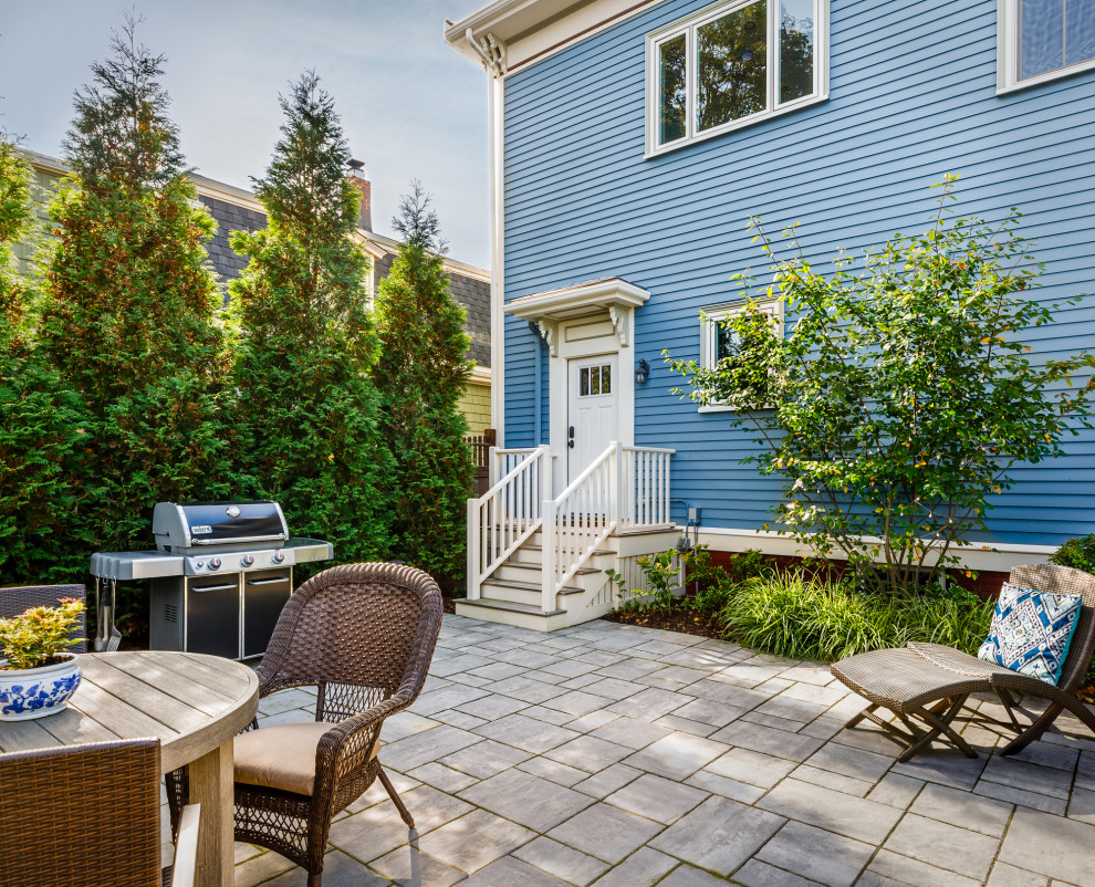 Inspiration for a mid-sized victorian two-storey blue duplex exterior in Boston with wood siding and clapboard siding.