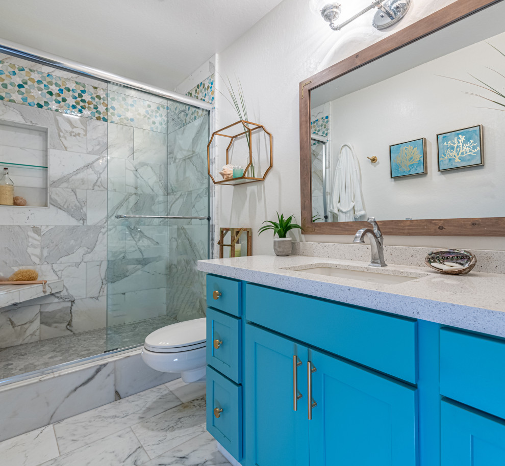 Inspiration for a small master bathroom in San Francisco with shaker cabinets, turquoise cabinets, an alcove shower, a wall-mount toilet, white tile, marble, white walls, marble floors, an undermount sink, engineered quartz benchtops, white floor, a sliding shower screen, white benchtops, a shower seat, a single vanity and a built-in vanity.