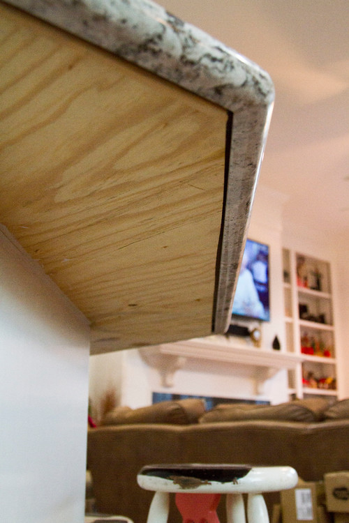 Help! Ugly Unfinished Underside of Cambria Quartz Countertop Solution?