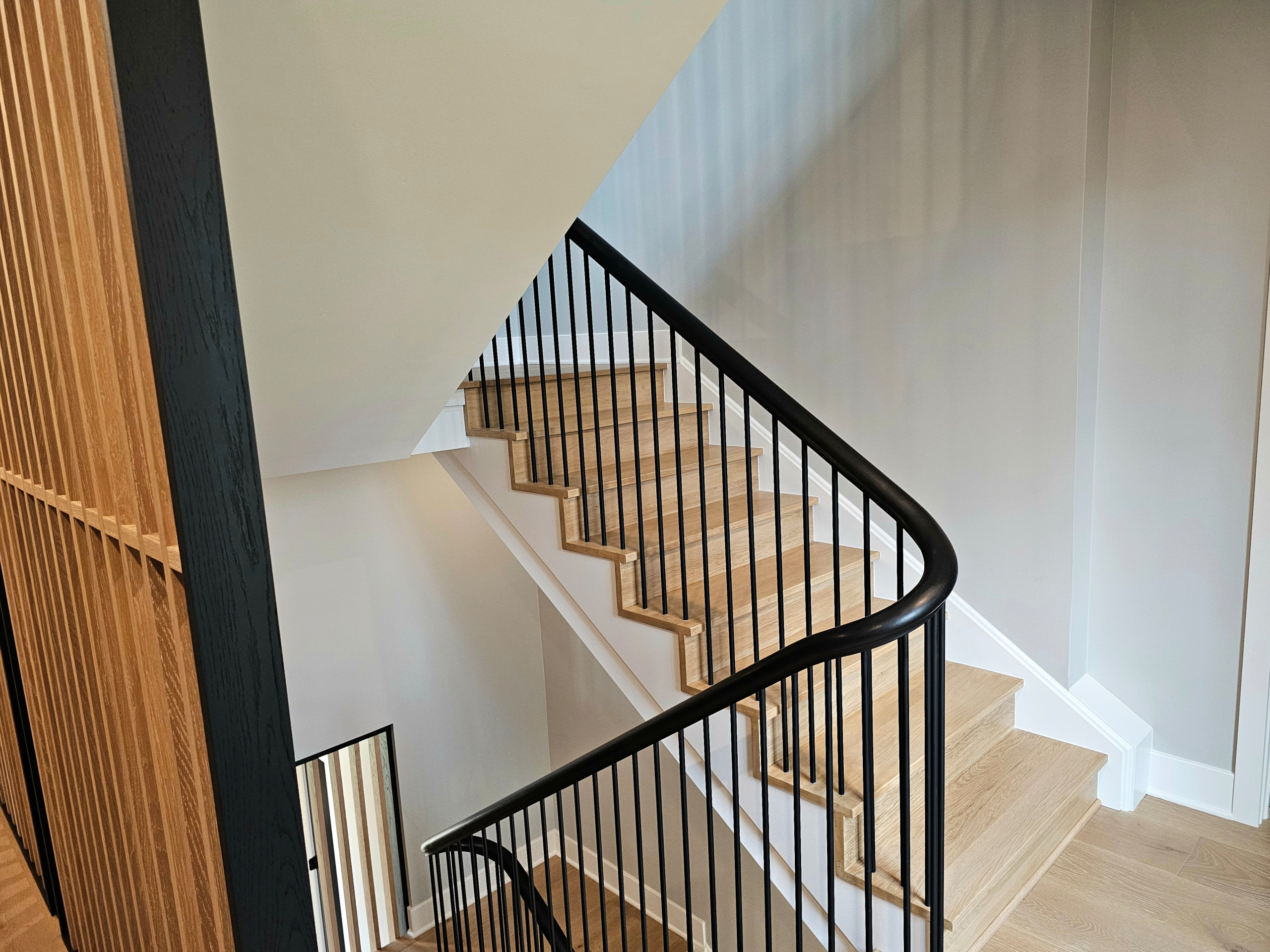 115_Stunning Continuous Rail System on 3 Story Floating Stairs; Arlington, VA 22