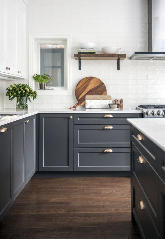 Inspiration for a mid-sized contemporary l-shaped dark wood floor and brown floor eat-in kitchen remodel in Columbus with an undermount sink, recessed-panel cabinets, gray cabinets, marble countertops, white backsplash, ceramic backsplash, stainless steel appliances, an island and white countertops