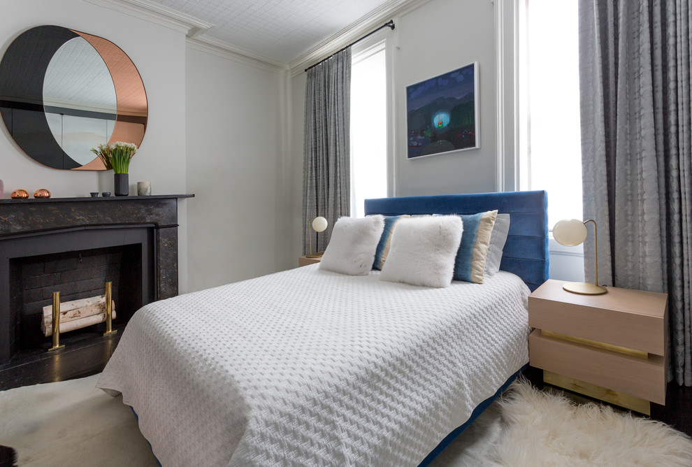 West Village Pied-A-Terre - Notable decor elements include: Bower Ring mirror,
Roll and Hill Modo table lamps from Matter,
Dualoy Shadow Fox pillows,
Lawson Fenning Stacked Box nightstands,
High Style Deco andirons,
Casamance Brume fabric for window panels,
Clerici Tessuto Nala Nala ombre fabric for pillows
Photography: Francesco Bertocci