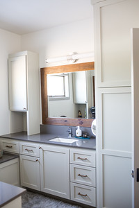 Mid-sized mountain style master gray tile and subway tile concrete floor and gray floor freestanding bathtub photo with shaker cabinets, white cabinets, a two-piece toilet, an undermount sink, granite countertops and a hinged shower door