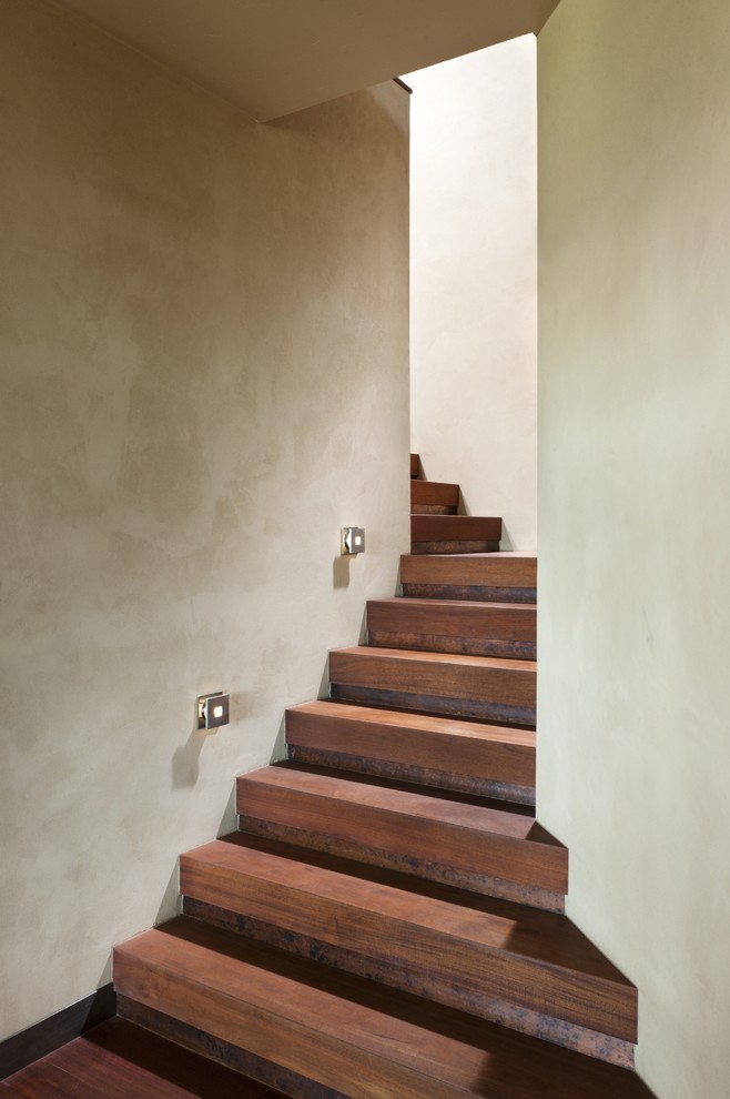 This is an example of a contemporary wood staircase in Other.
