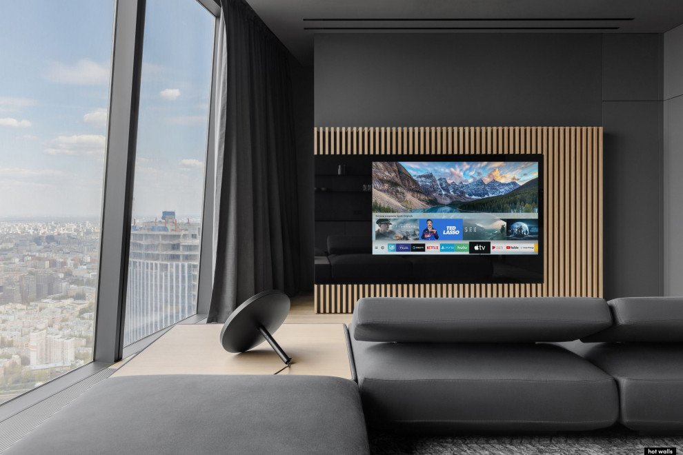 Inspiration for a large contemporary open plan living room in Moscow with grey walls and a concealed tv.