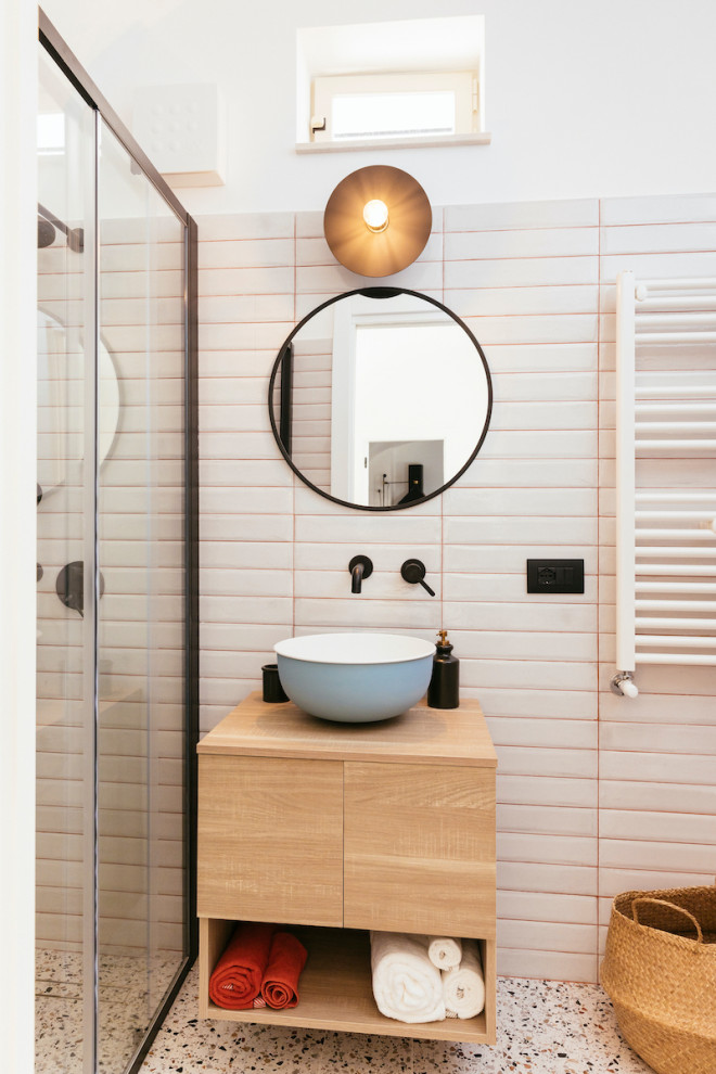 Design ideas for a small contemporary 3/4 bathroom in Bari with light wood cabinets, a curbless shower, a wall-mount toilet, a vessel sink, wood benchtops, a sliding shower screen, a single vanity and a floating vanity.