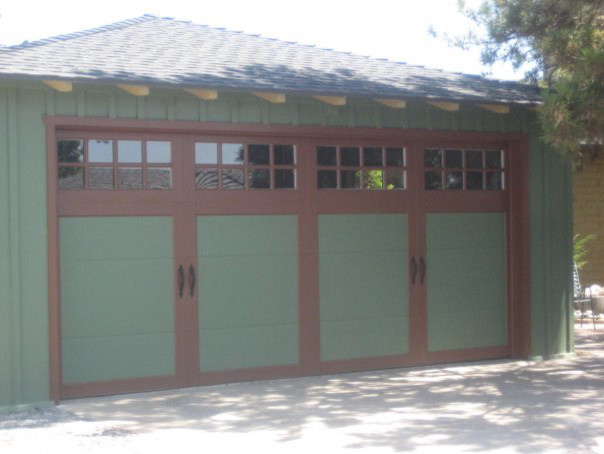 Design ideas for an arts and crafts attached two-car garage in San Diego.