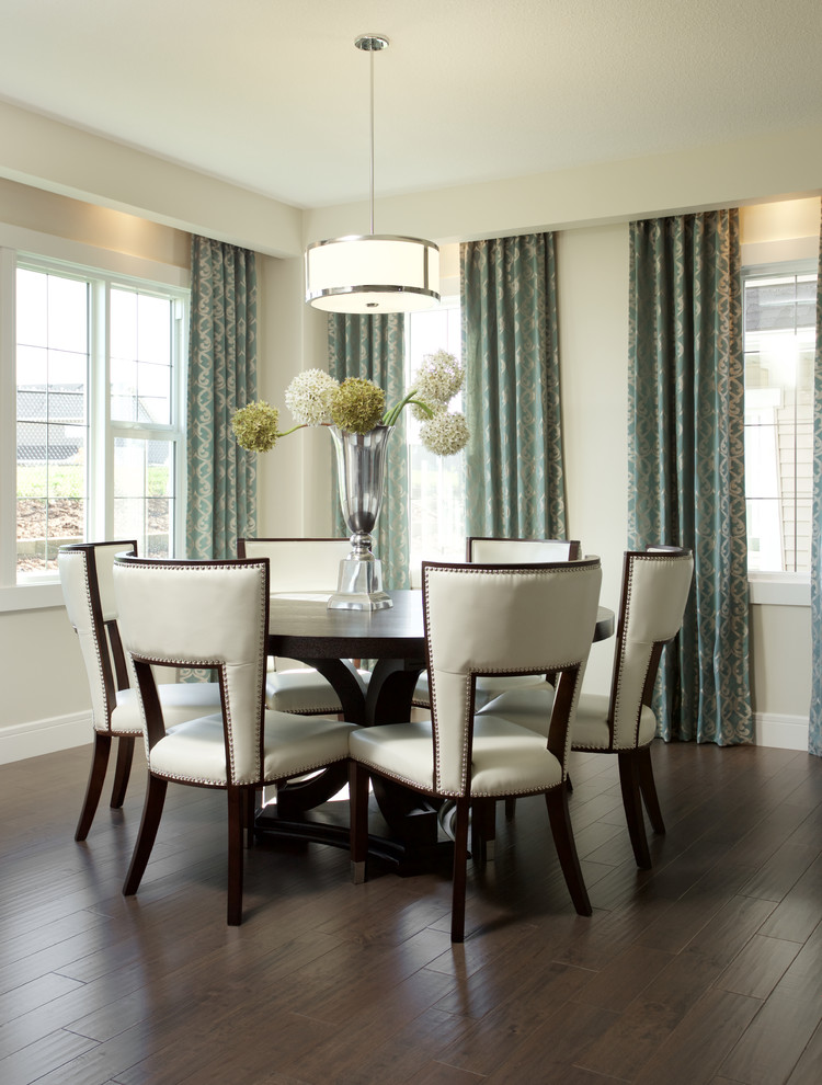 Mid-sized transitional open plan dining in Edmonton with beige walls and dark hardwood floors.