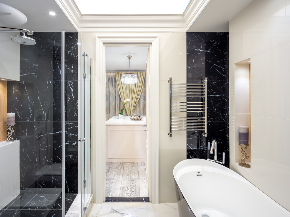 This is an example of a mid-sized transitional master bathroom in Moscow with flat-panel cabinets, black cabinets, a freestanding tub, an open shower, a wall-mount toilet, beige tile, glass tile, beige walls, porcelain floors, a pedestal sink, terrazzo benchtops, multi-coloured floor, a hinged shower door, black benchtops, an enclosed toilet, a single vanity, a built-in vanity and recessed.