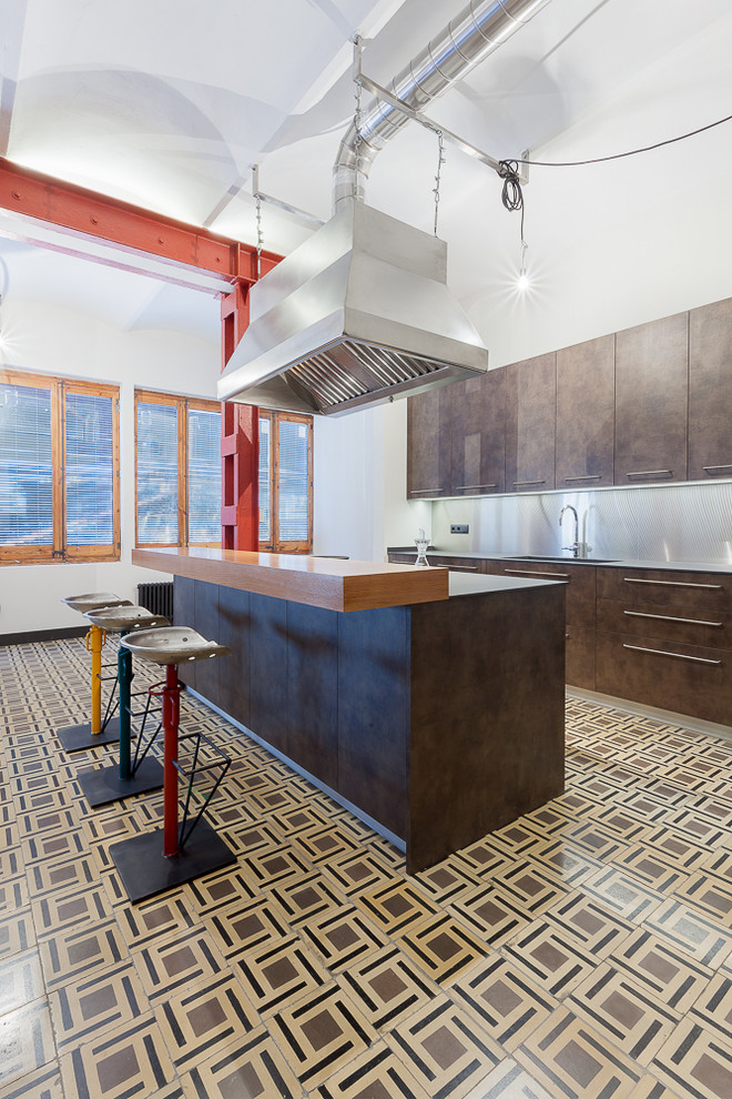 Inspiration for a large industrial l-shaped open plan kitchen in Other with a single-bowl sink, flat-panel cabinets, brown cabinets, stainless steel appliances, ceramic floors and with island.