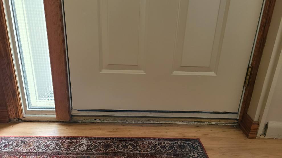 Example of a small mountain style entryway design in Calgary