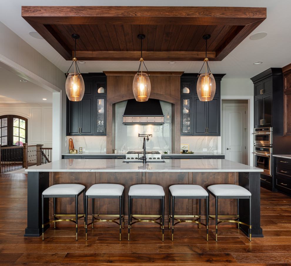 Example of a transitional kitchen design in Cincinnati with an island