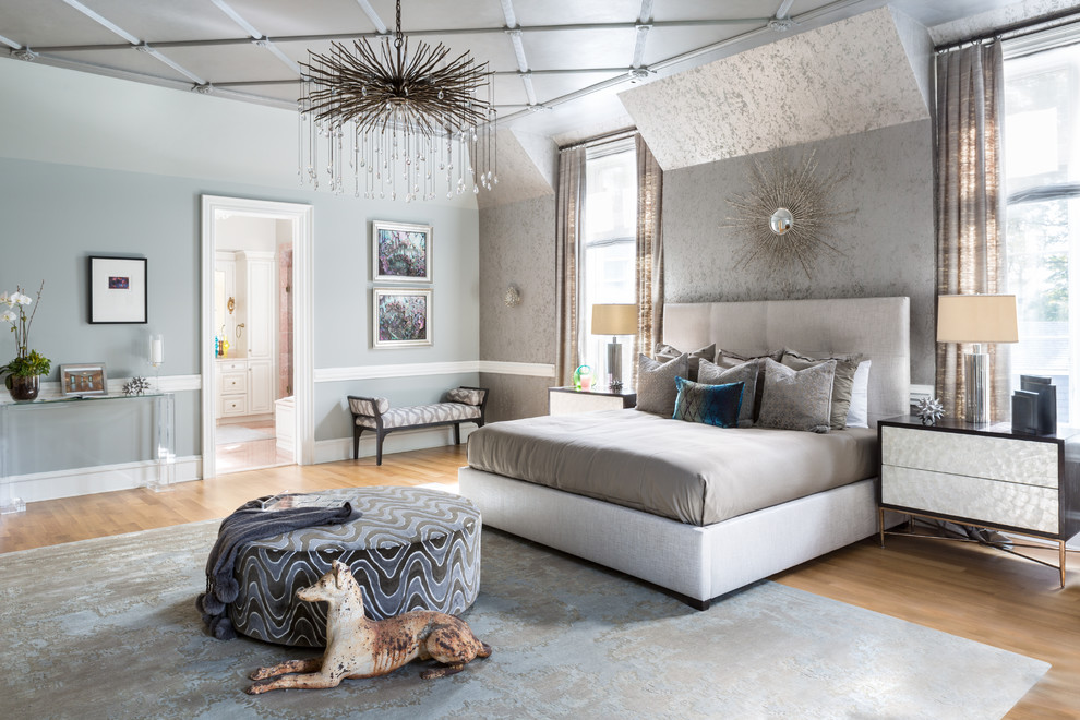 Design ideas for a transitional master bedroom in DC Metro with grey walls, light hardwood floors and beige floor.