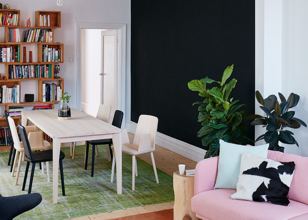 This is an example of a contemporary dining room in Melbourne.