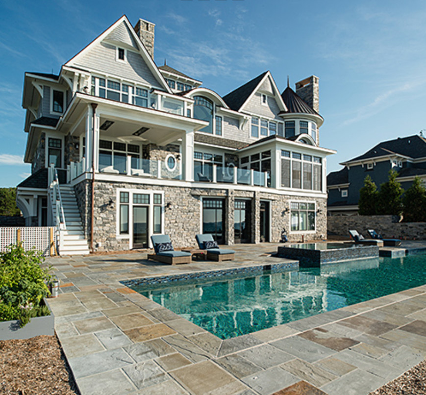 Hot tub - large transitional backyard stone and custom-shaped natural hot tub idea