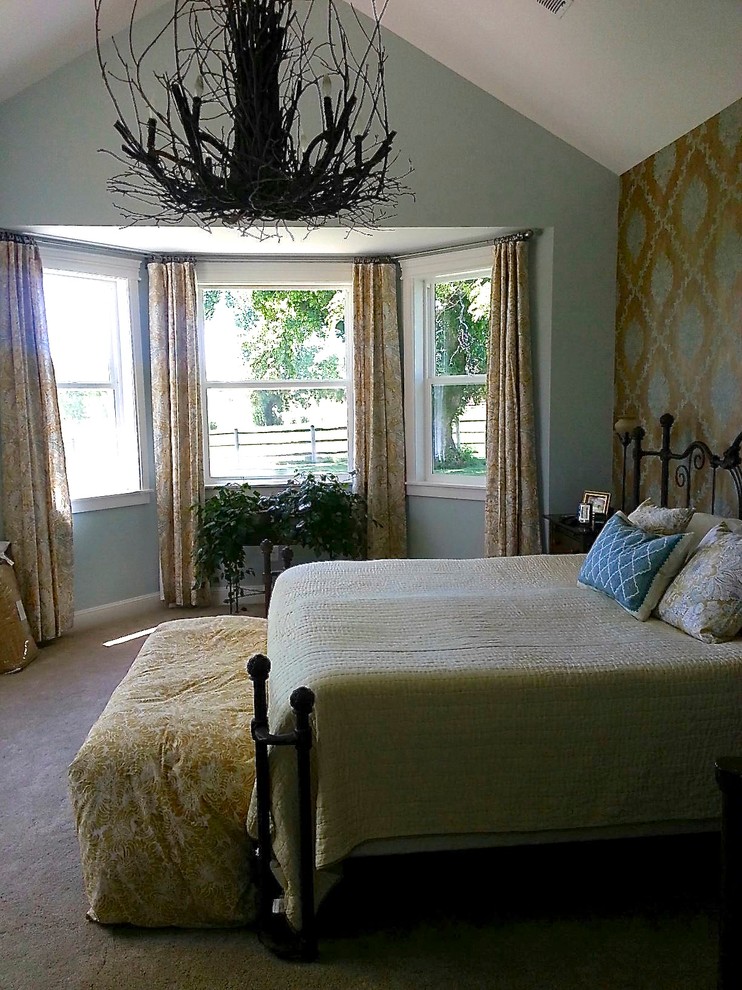 Inspiration for a mid-sized country master bedroom in Denver with blue walls, carpet and no fireplace.