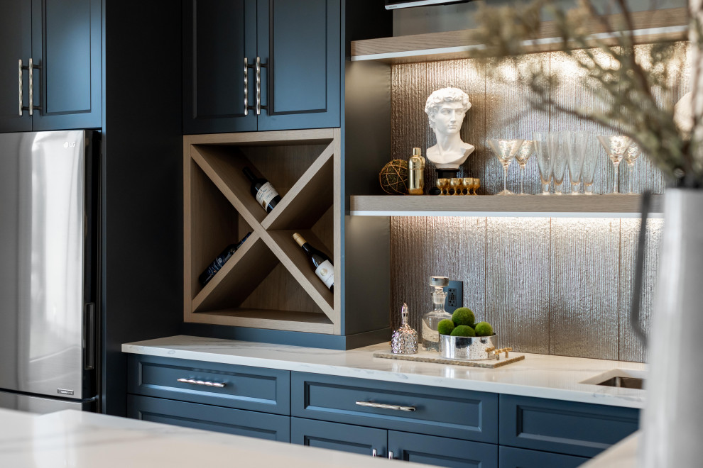 Inspiration for a small classic wet bar in Vancouver with a submerged sink, shaker cabinets, blue cabinets, quartz worktops, grey splashback, ceramic splashback, light hardwood flooring, brown floors and multicoloured worktops.