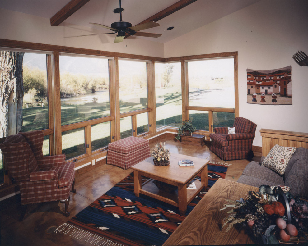 Inspiration for a mid-sized rustic enclosed medium tone wood floor living room remodel with white walls