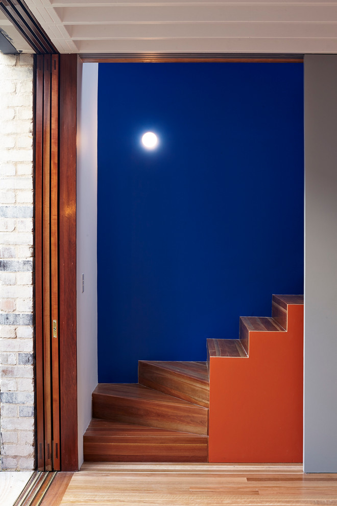 Mid-sized contemporary wood l-shaped staircase in Sydney with wood risers.
