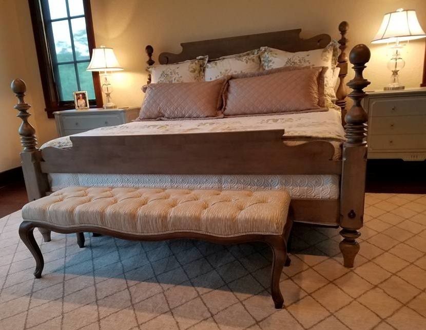Inspiration for a large transitional master medium tone wood floor bedroom remodel with white walls and no fireplace