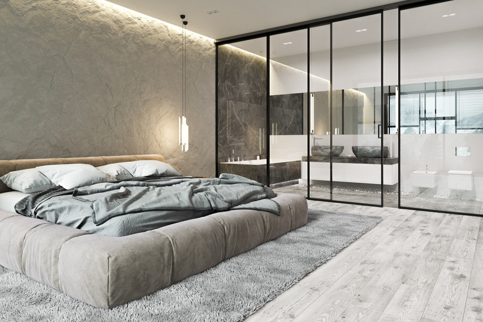 This is an example of a large modern master bedroom in Toronto with beige walls, light hardwood floors and grey floor.