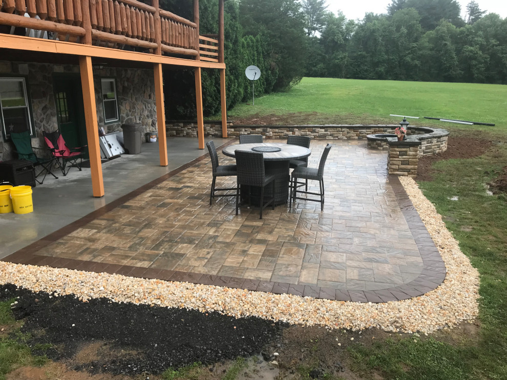 Patio - rustic concrete paver patio idea