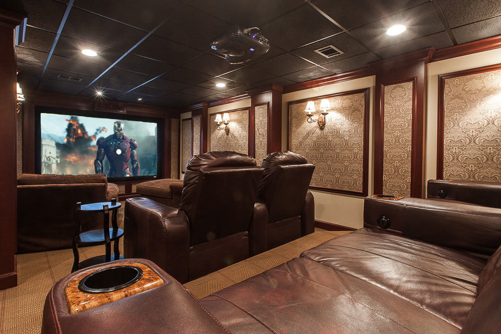 Small traditional enclosed home theatre in New York with brown walls, carpet and a projector screen.