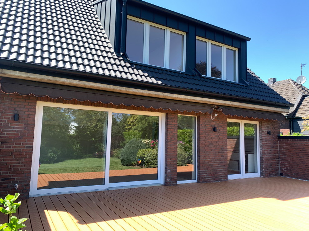 Modernisierung Einfamilienhaus mit Erweiterung der Gauben und  Fensteraufteilung