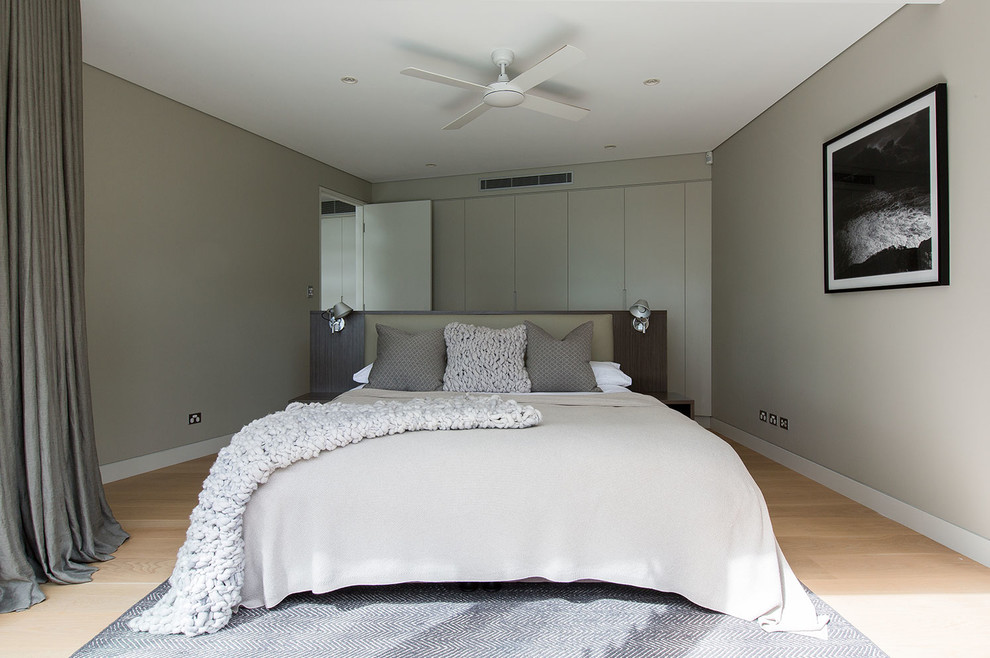 Design ideas for a beach style bedroom in Sydney.
