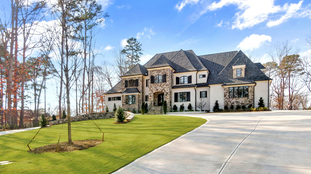 Design ideas for a large and white classic detached house in Raleigh with three floors, stone cladding, a hip roof, a shingle roof and a black roof.