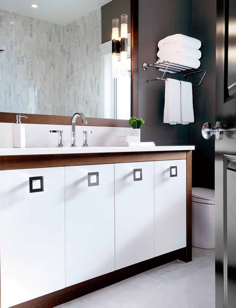Photo of a contemporary bathroom in Other with flat-panel cabinets, white cabinets and white tile.