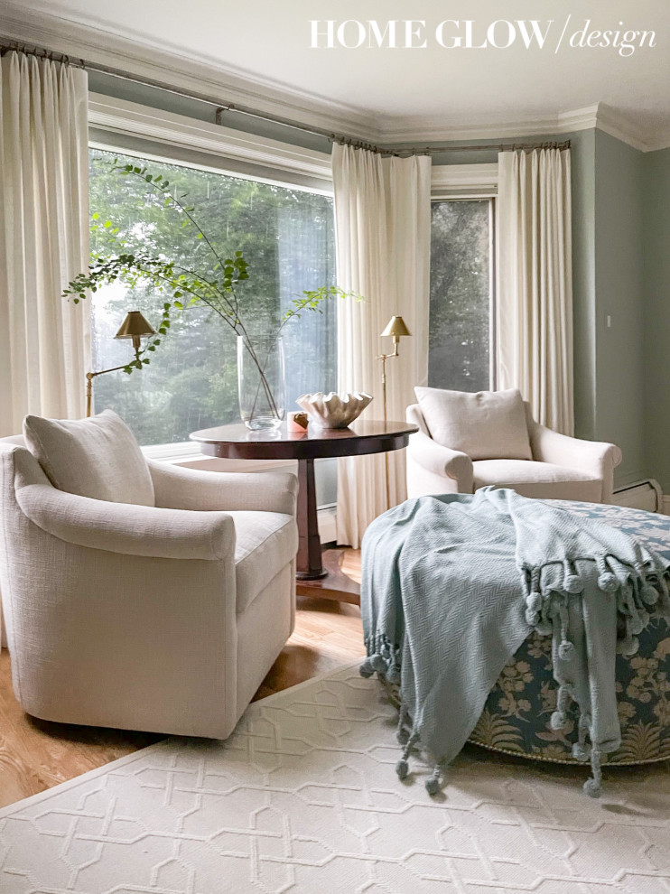 Inspiration for a mid-sized traditional master bedroom in Boston with blue walls.