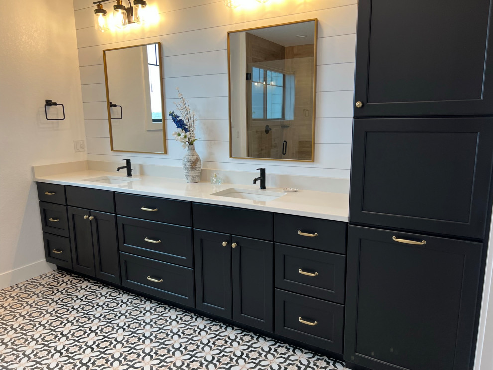 This is an example of a mid-sized contemporary master bathroom in Denver with shaker cabinets, black cabinets, an open shower, white walls, ceramic floors, an undermount sink, engineered quartz benchtops, black floor, a hinged shower door, white benchtops, an enclosed toilet, a double vanity, a built-in vanity and planked wall panelling.