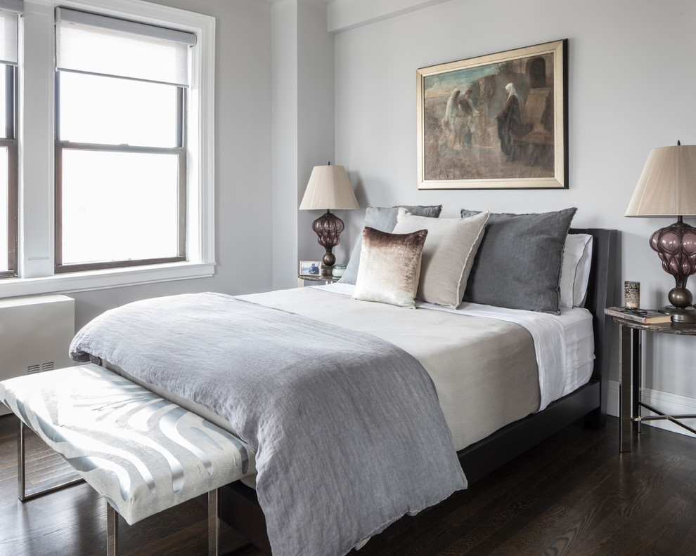 Small transitional master bedroom in Denver with grey walls, dark hardwood floors and brown floor.