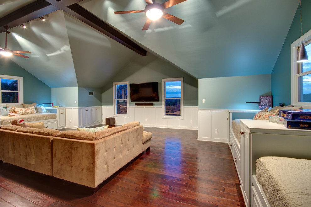 Large contemporary open concept family room in Austin with a game room, medium hardwood floors, no fireplace, a wall-mounted tv and blue walls.
